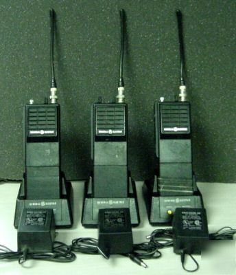  (3) g.e. vhf 2WAY radios w/ deskchargers 