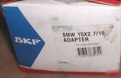 New skf snw 15X2.7/16 adapter w/nut and lockwasher * *
